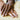 Older adult's hands resting together