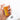 Hand holding a small medical container